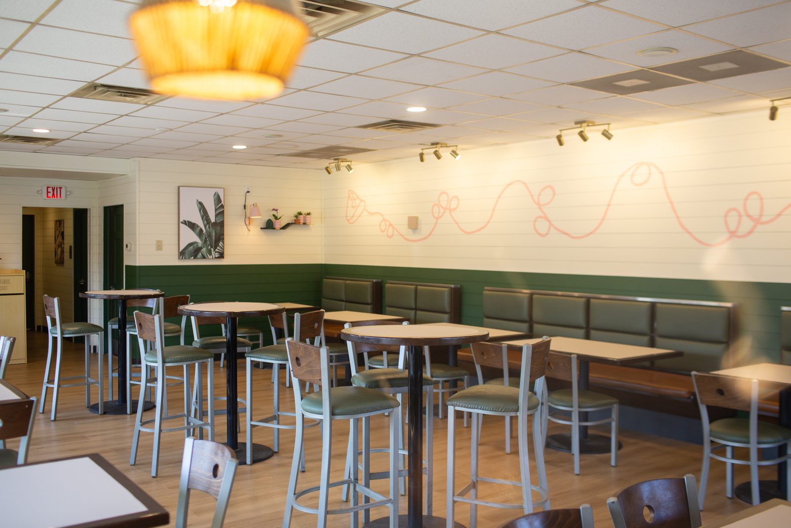 The Barclay Pies dining room set with tables and booths for a private event
